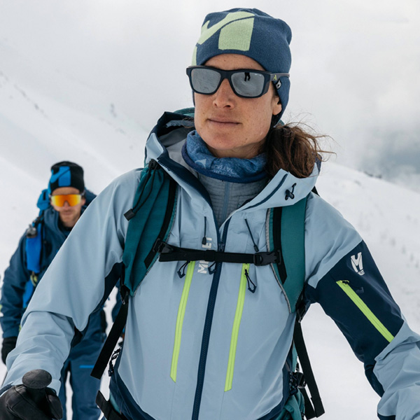 Woman wearing Millet technical ski apparel