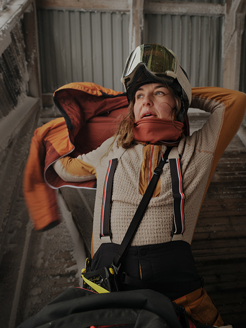 Woman wearing Elevenate ski jacket, fleece and ski pants