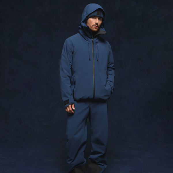 Man wearing Head KORE ski jacket and ski pants