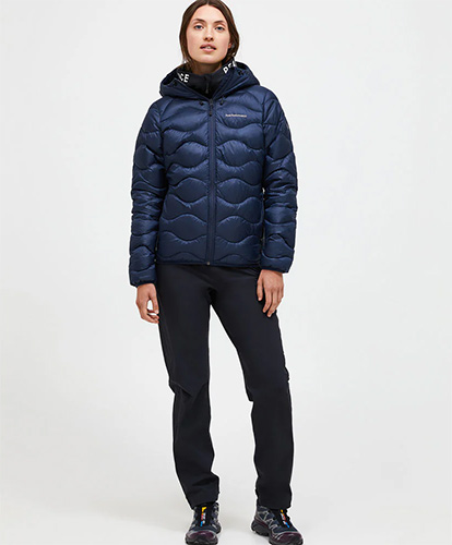 Woman wearing Peak Performance ski jacket in Vail