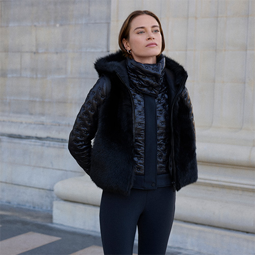 Women wearing a ski vest from Vonn designer ski apparel
